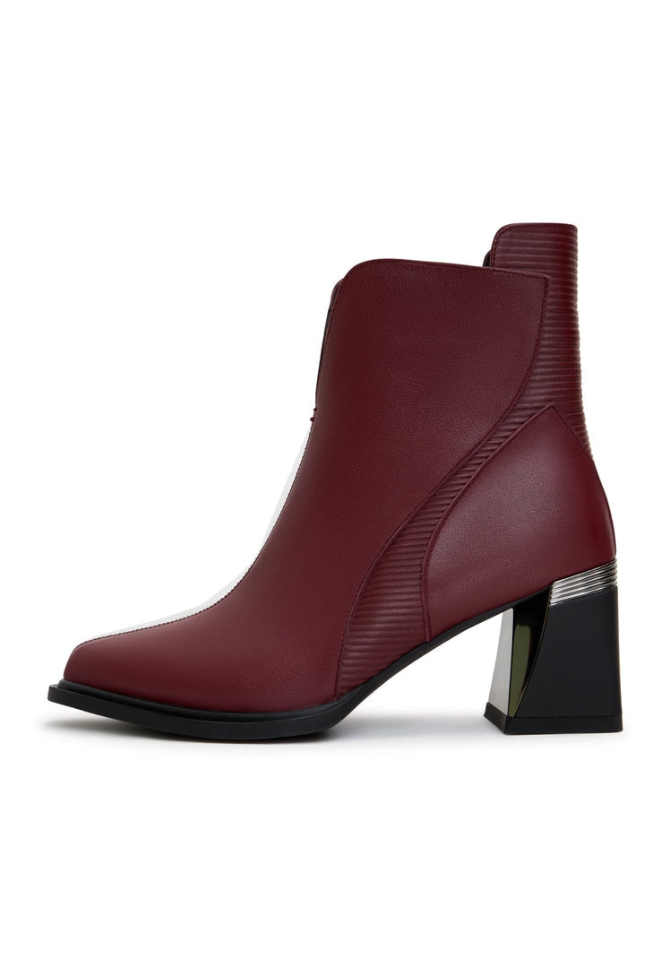 A stylish pair of trendy block heel ankle boots in a rich bordeaux color, perfect for fall fashion and the ultimate ankle boots for women.