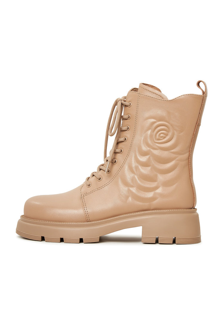 A stylish pair of women's beige leather ankle platform boots, ideal for fashion-forward footwear enthusiasts.