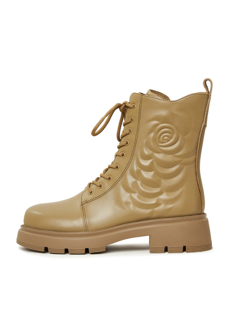 Stylish green leather platform ankle boots, perfect for making a statement with their unique design.