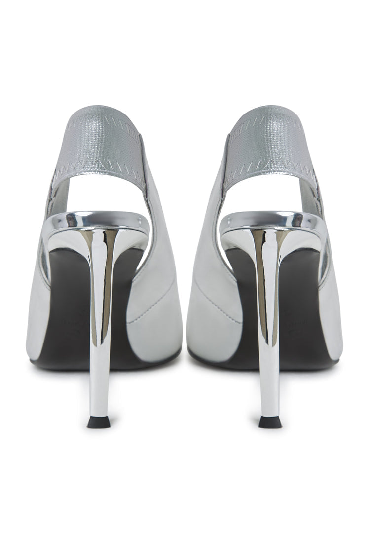 A stylish pair of women's high heel shoes featuring slingback design, high heeled pumps known as Patricia pumps, in a stunning silver color.