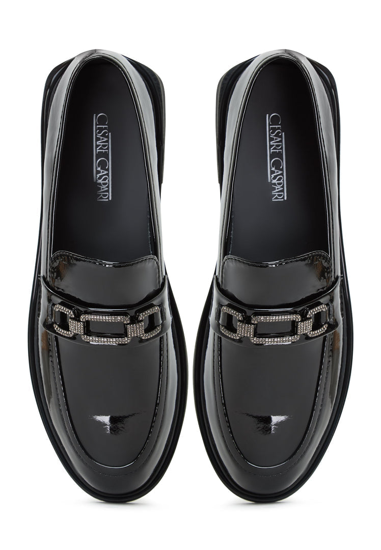 A stylish pair of Maia block heel loafers, a must-have for any woman's wardrobe - designer, trendy, and chic!