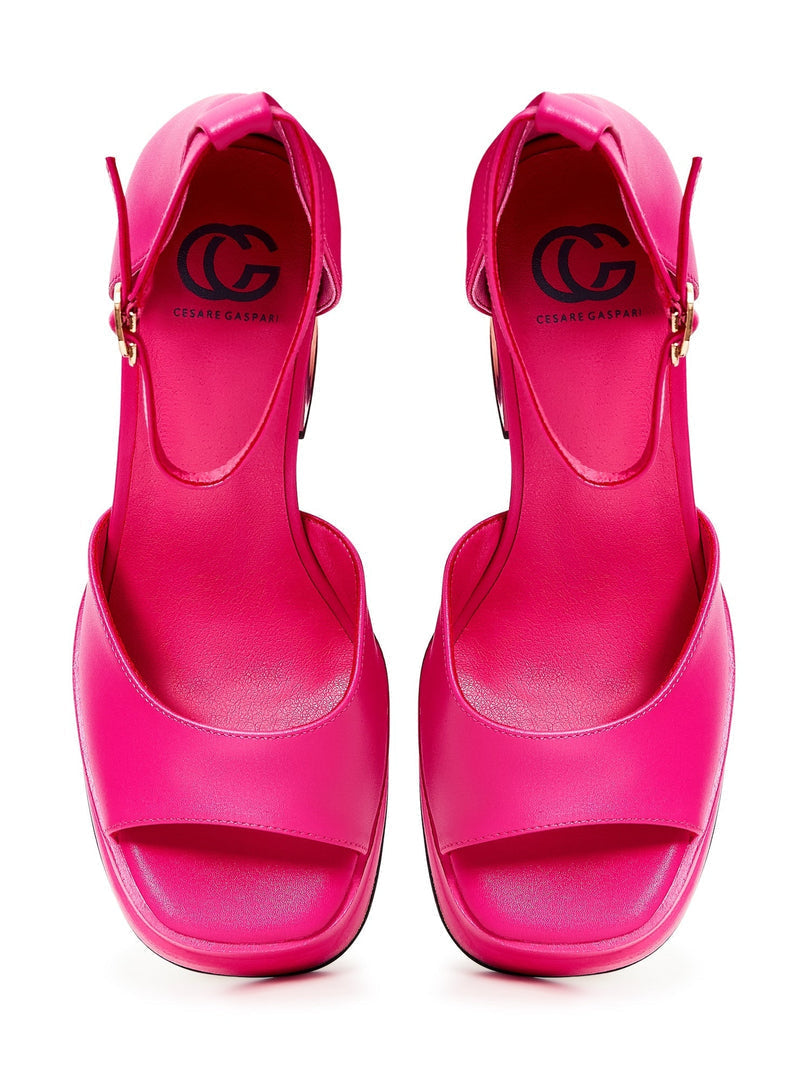 A pair of stunning fuchsia women's high heel sandals with an open toe design, perfect for a classic and stylish look.