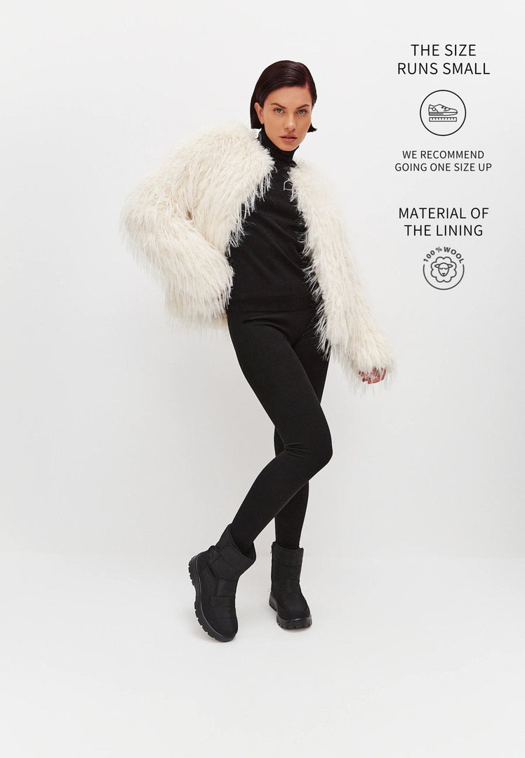A stylish pair of women's platform winter boots, perfect for staying warm and fashionable in cold weather.