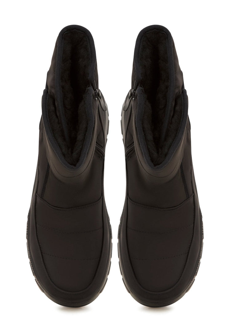 A stylish pair of women's winter platform boots, perfect for cold weather, with a cozy and warm design.