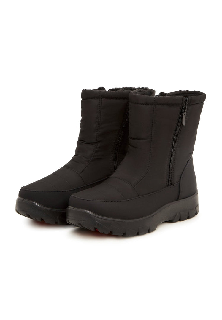Stay warm and stylish this winter with these cozy suede boots, perfect for cold weather fashion.
