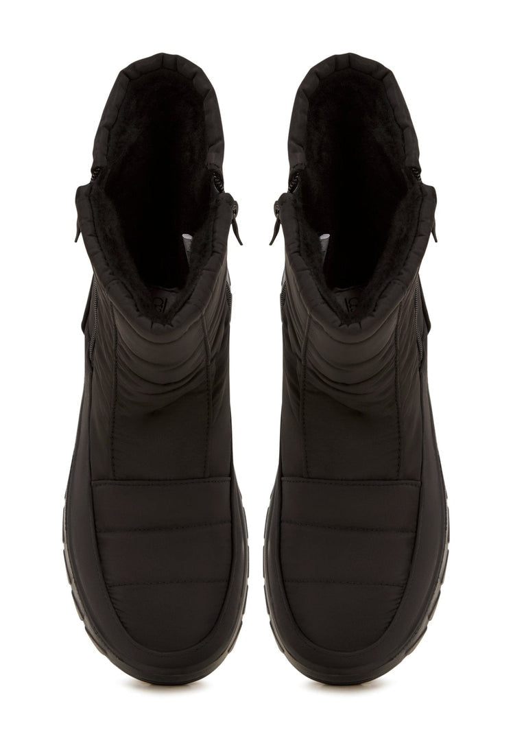 Stay warm and stylish this winter with these cozy suede boots, perfect for cold weather fashion.
