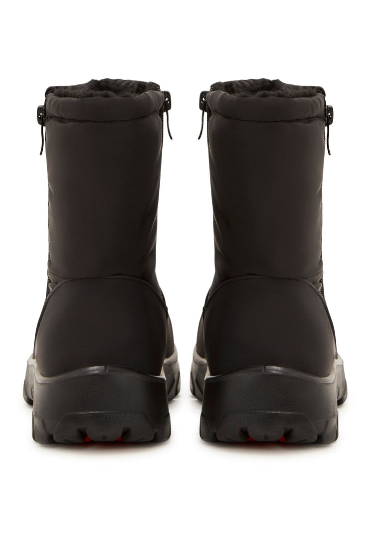 Stay cozy and stylish this winter with a pair of warm suede boots, perfect for cold weather and winter fashion.