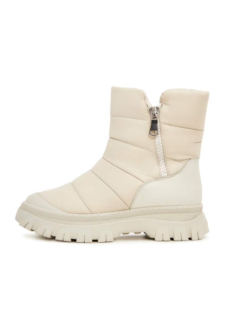 A stylish pair of beige platform winter boots for women, perfect for staying warm and fashionable this season.