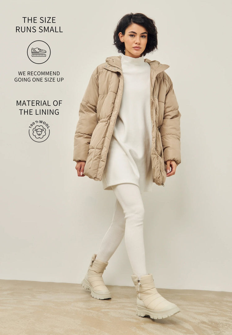 A stylish pair of beige platform winter boots for women, perfect for staying warm and fashionable in the cold weather.