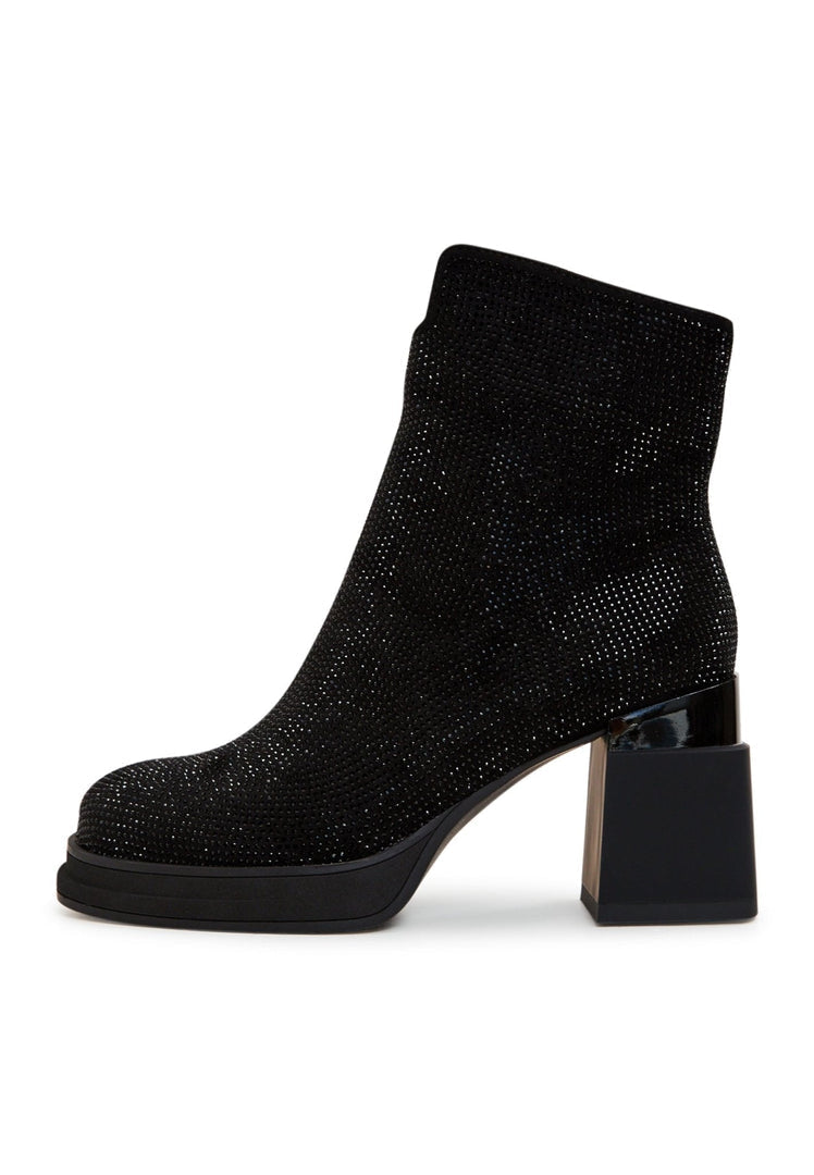 A stylish pair of women's black leather ankle boots with block heels, perfect for completing any fashion-forward look.