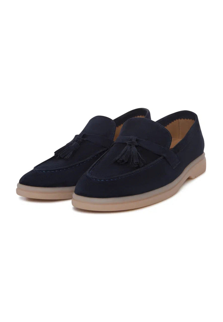A pair of stylish and comfortable dark blue Aurelia platform moccasins for women.