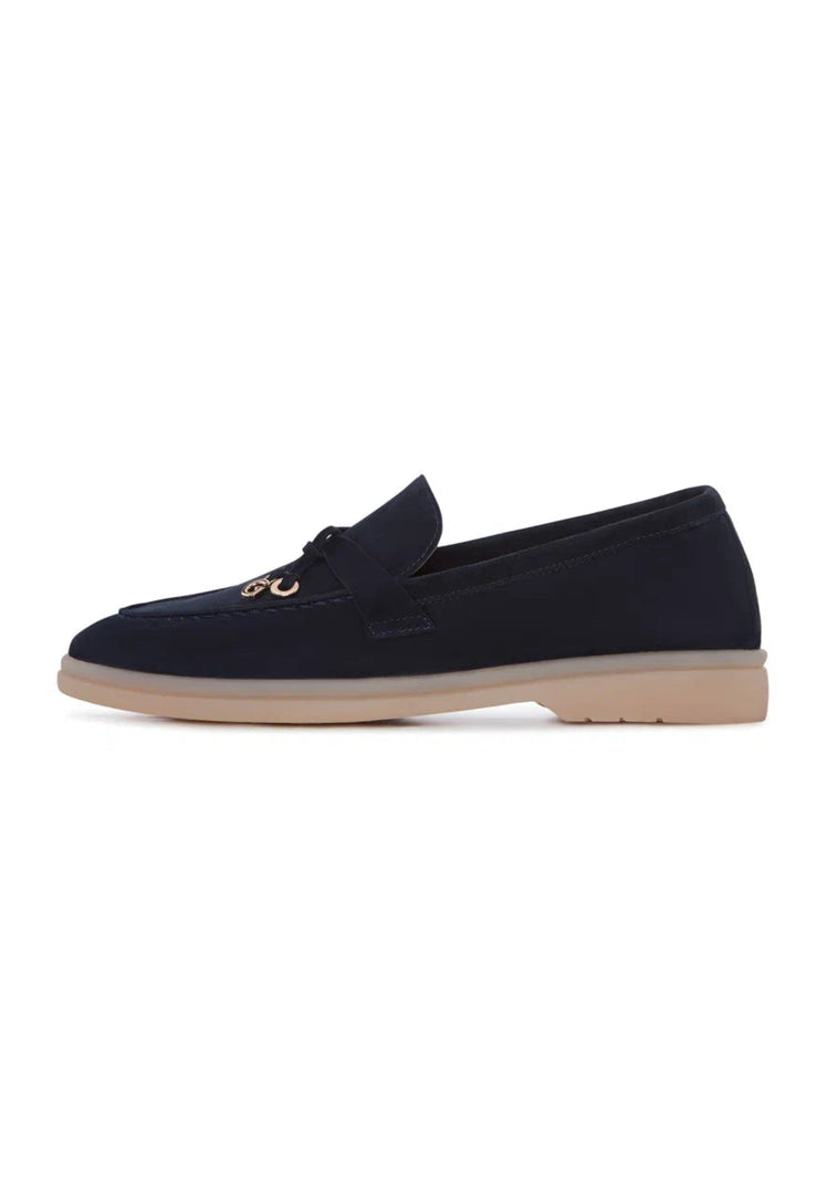 A pair of stylish dark blue Aurelia moccasins with a platform sole, perfect women's comfortable shoes.
