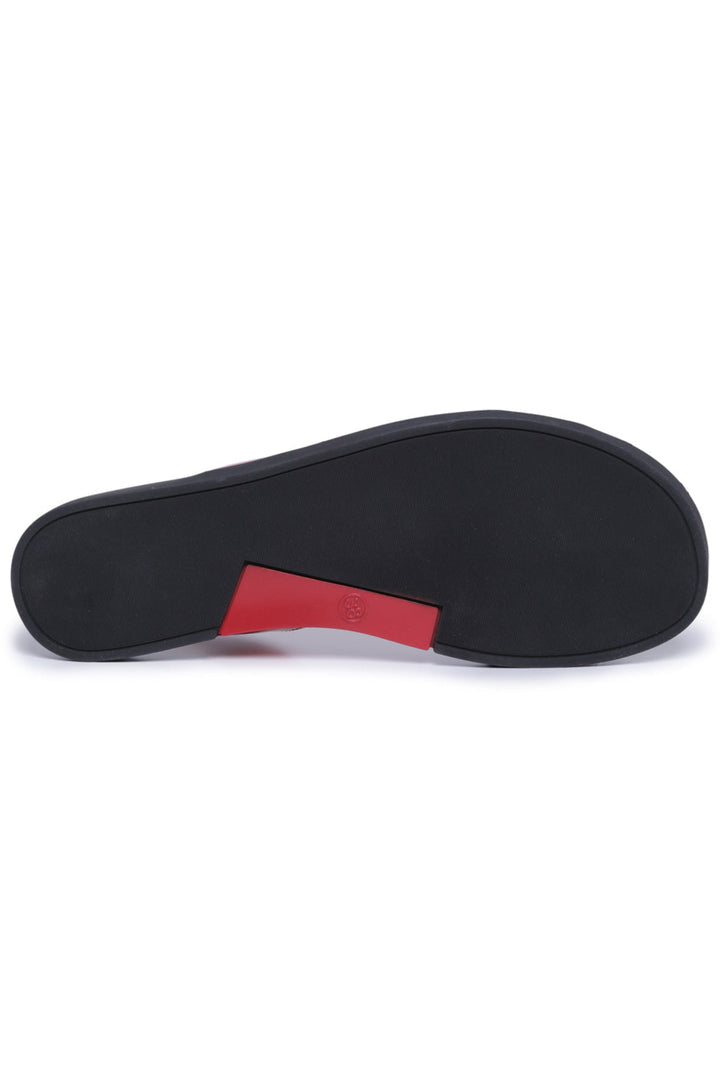 A stylish pair of glossy slingback flats for women's fashion footwear enthusiasts.