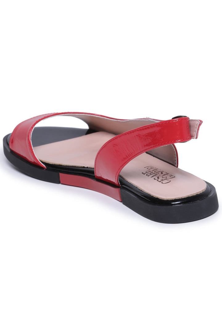 A trendy pair of glossy slingback flats - a stylish choice in women's footwear fashion.