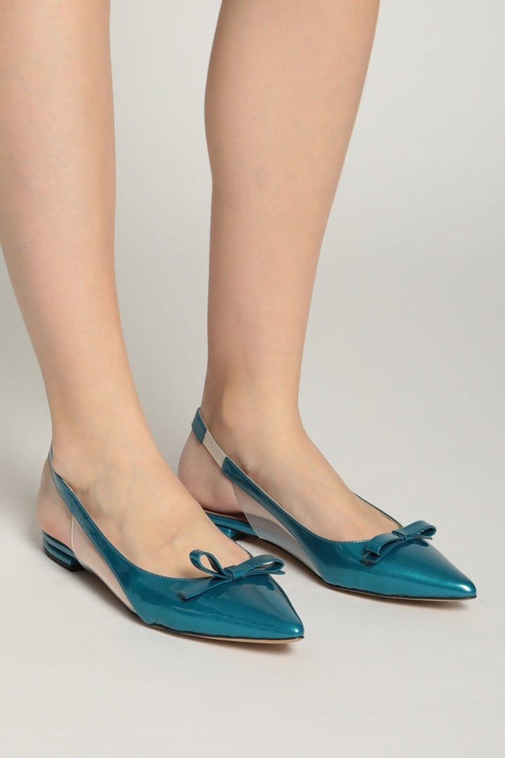 A pair of stylish women's blue slingbacks with a delicate bow detail, perfect for adding a touch of elegance to any outfit.