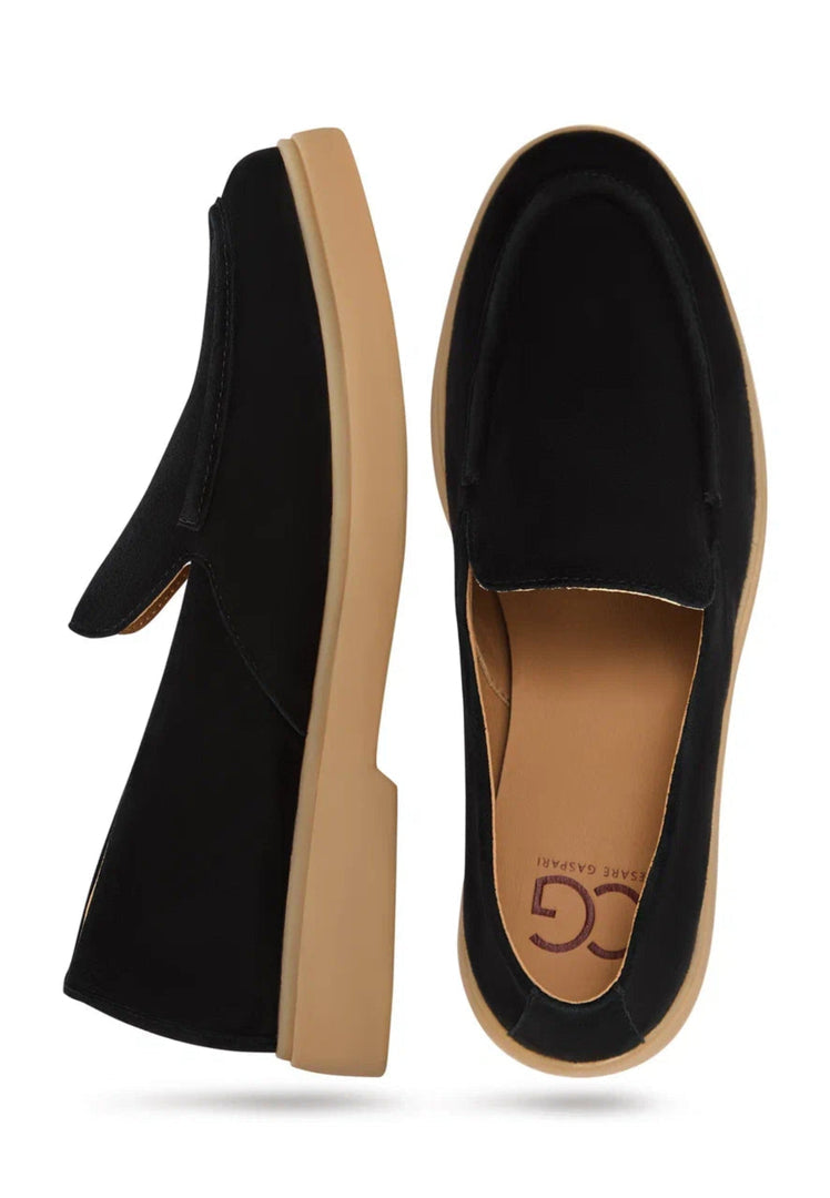 A pair of stylish and comfortable men's black loafers, perfect for urban ease.