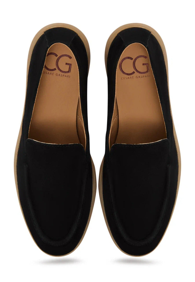 A stylish and comfortable pair of black Urban Ease loafers for men.