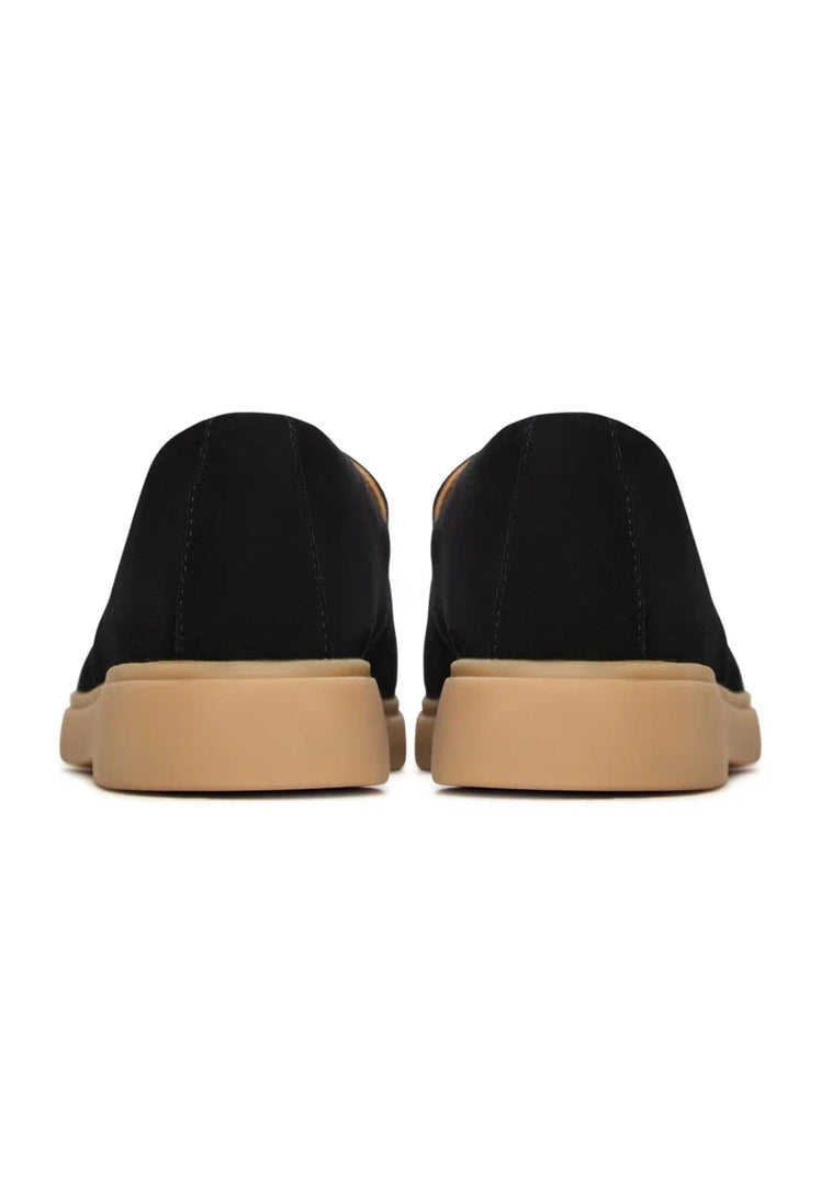 A pair of stylish and comfortable black Urban Ease loafers for men.