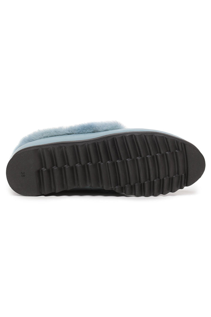 A pair of stylish Frost Charm Fur Loafers for women, perfect for the cold weather winter season.
