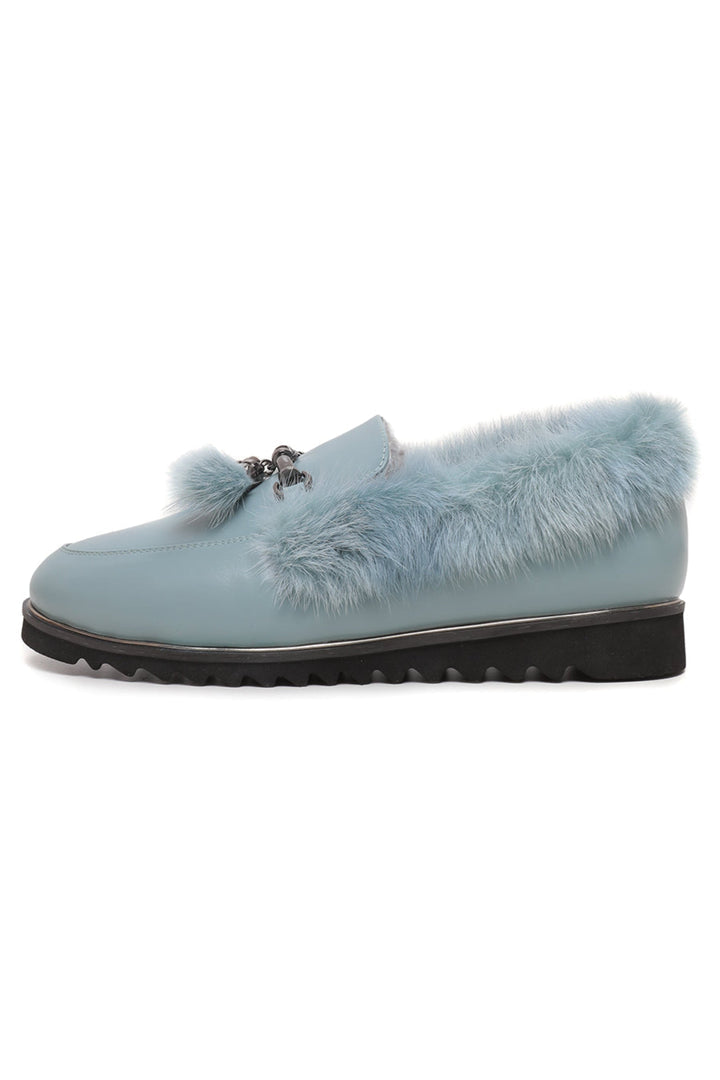 A pair of Frost Charm Fur Loafers for women, perfect for cold weather and stylish winter footwear.