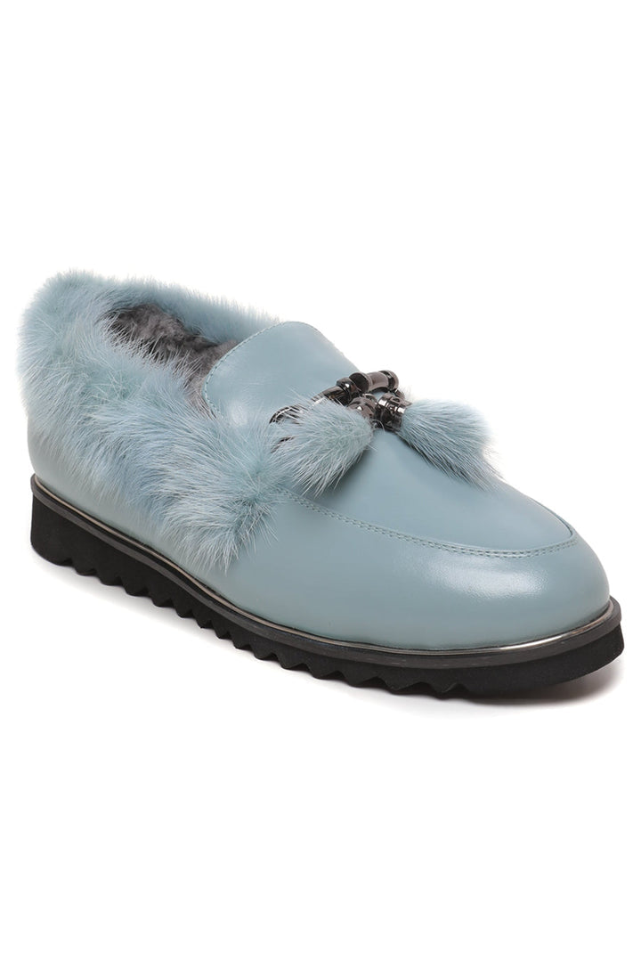 A cozy pair of Frost Charm Fur Loafers for women, perfect for winter with their stylish design and warmth-giving furry texture.