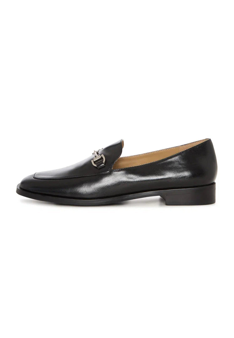 A stylish pair of equestrian chic black loafers - the perfect combination of fashionable and trendy equestrian footwear.