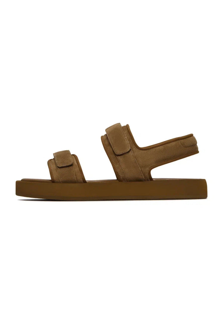 A pair of brown suede comfort sandals for women with velcro fastening, perfect for casual and comfortable wear.
