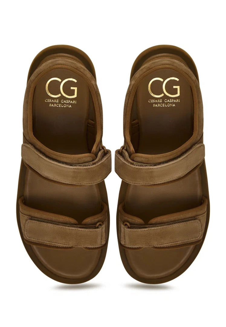 A pair of women's brown suede comfort sandals with velcro fastening, perfect for casual everyday wear.