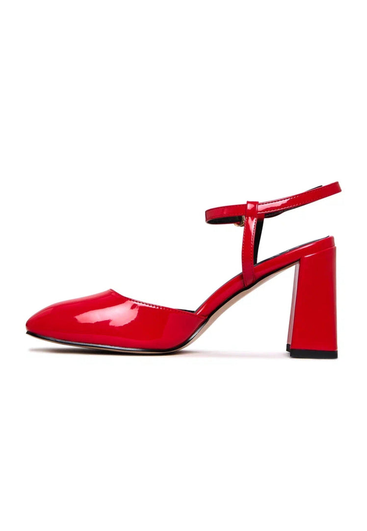 Stylish red patent block heel pumps in glossy patent leather - elevate your outfit with these elegant red high heels.