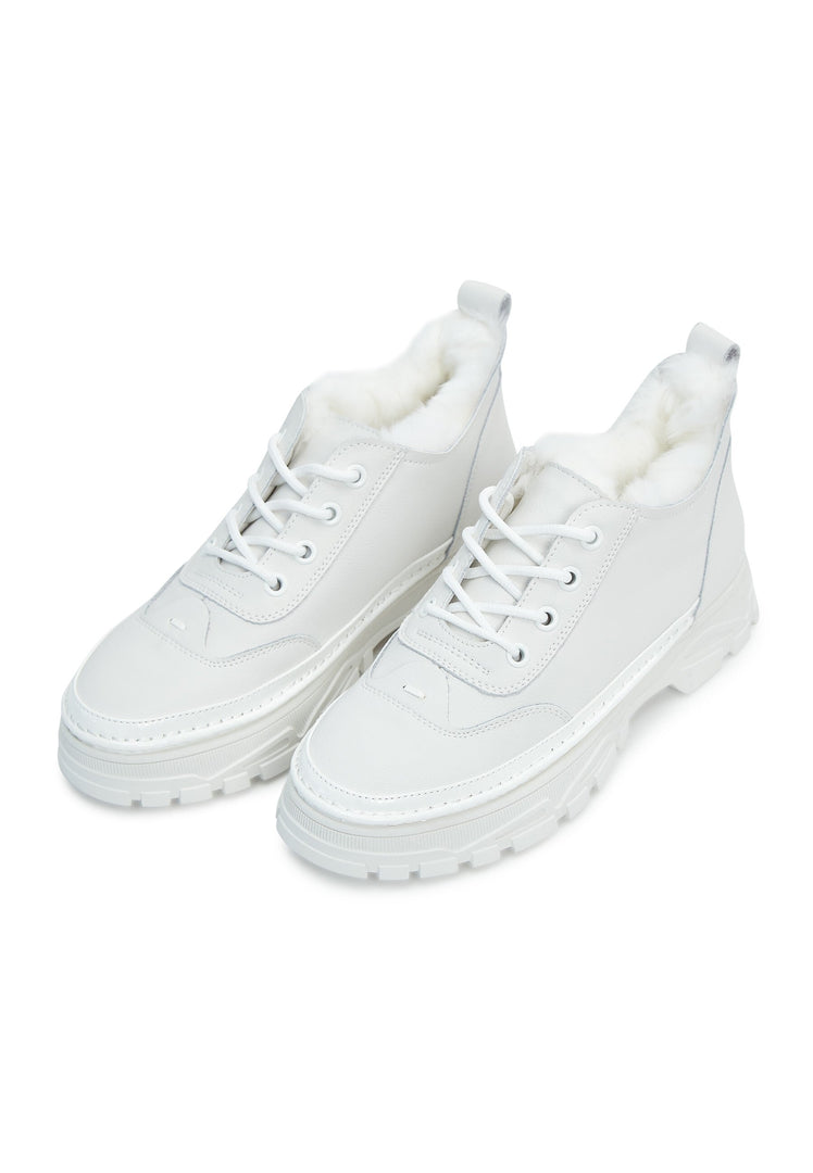Stylish and cozy merino wool-lined chunky white sneakers for ultimate comfort and style.