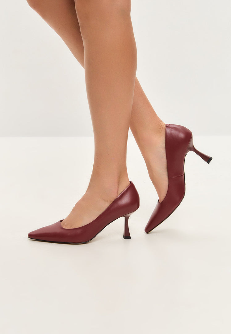 A pair of elegant Bordeaux leather pumps, classic designer heels for sophisticated style.