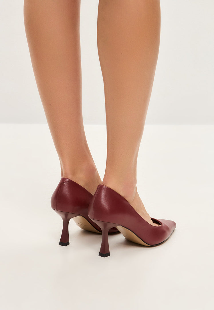 A stylish pair of Bordeaux leather pumps, the perfect combination of classic pumps and designer footwear with sleek leather heels.