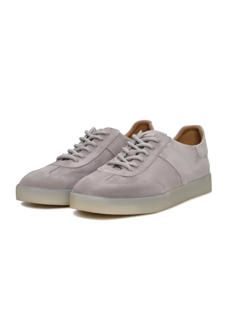 A pair of stylish gray suede low-top sneakers, perfect for a classic and stylish footwear look.