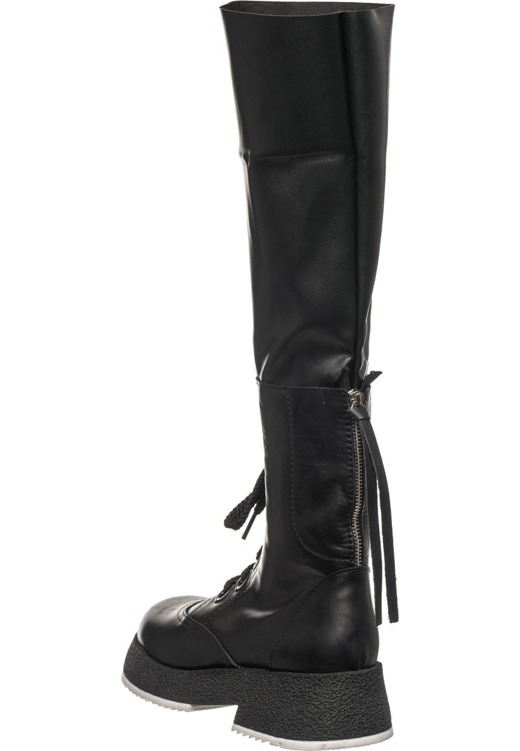 A stylish collection of women's fashion boots including over-the-knee boots, lace-up combat boots, and trendy knee-high lace-up boots.