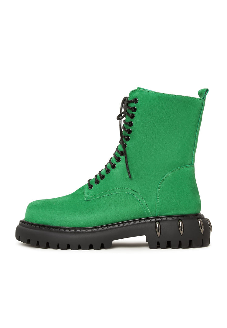 A fashionable pair of lace-up combat boots with a chunky sole in green, perfect for military style and women's fashion footwear enthusiasts.