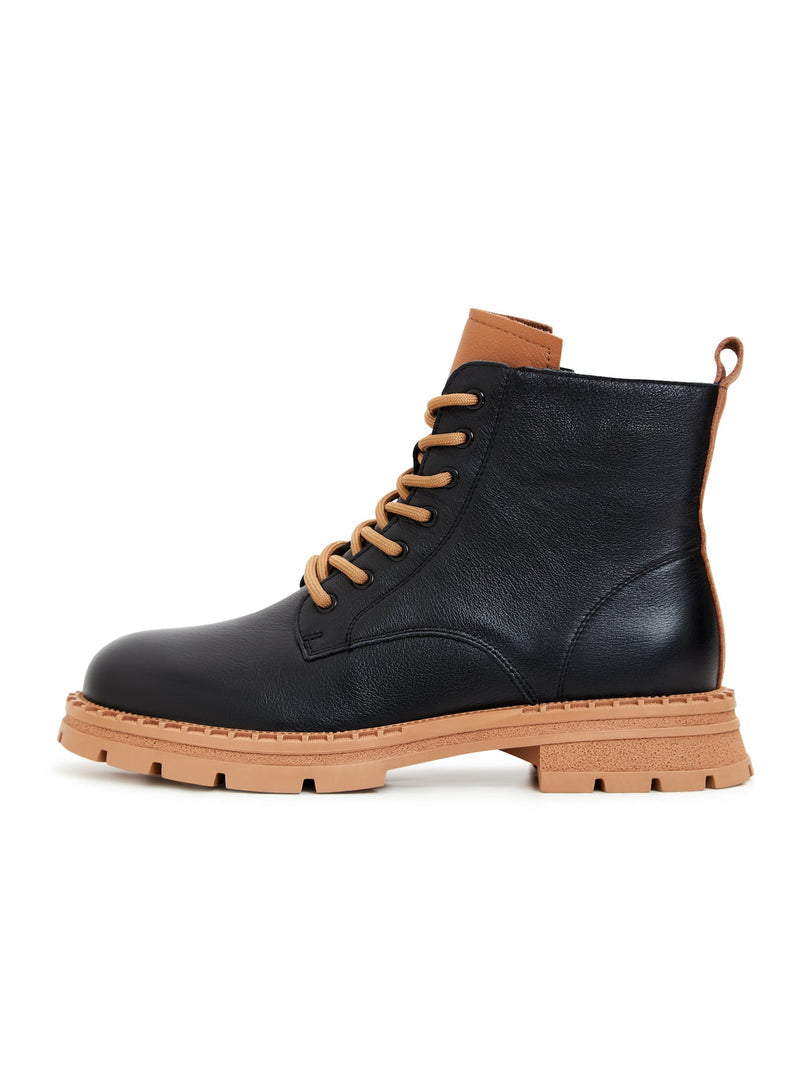 A stylish pair of black lace-up leather ankle boots for women - perfect for a fashion-forward look.