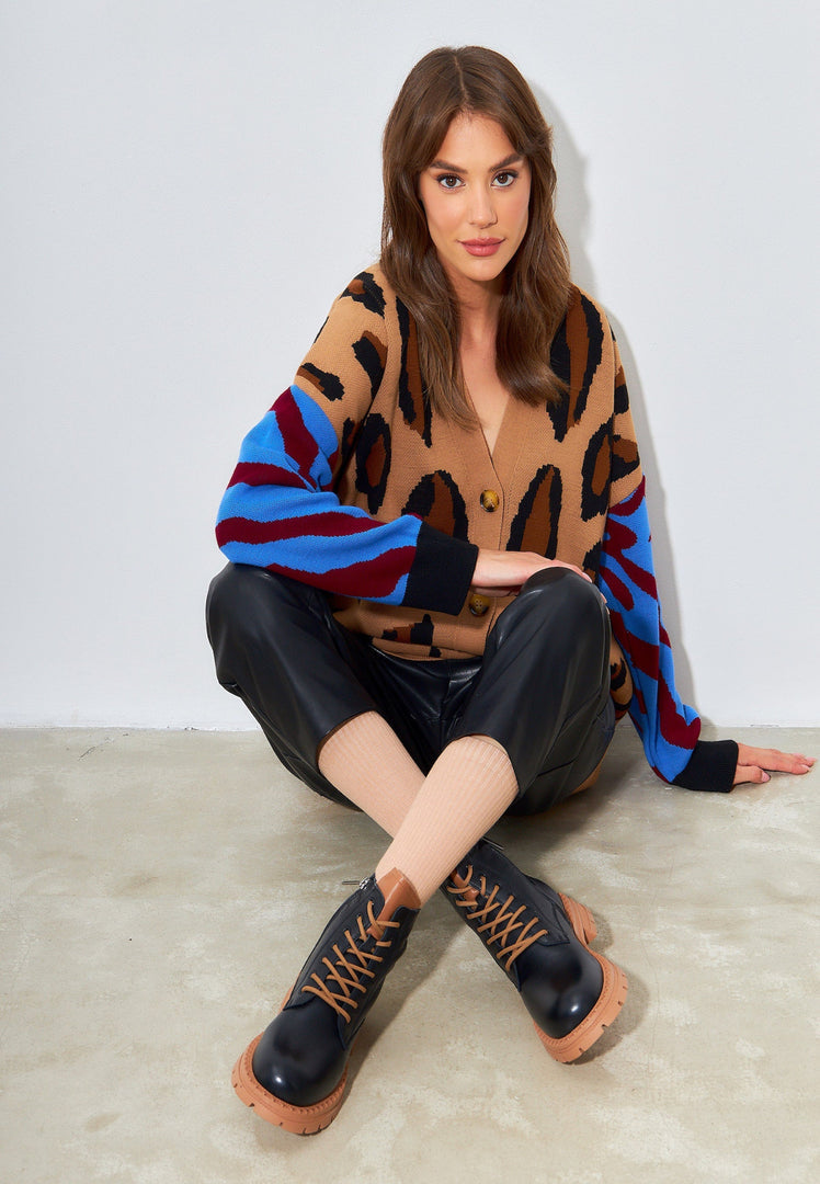A stylish pair of black leather lace-up ankle boots for women, perfect for adding a fashion-forward touch to any outfit.
