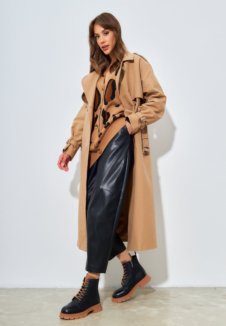 A stylish pair of black leather lace-up ankle boots for women, perfect for any fashion-forward outfit.