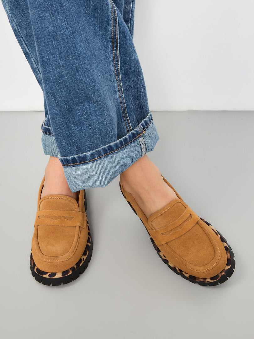A trendy pair of chic loafers with a chunky sole in lily brown, perfect for women's fashion footwear.