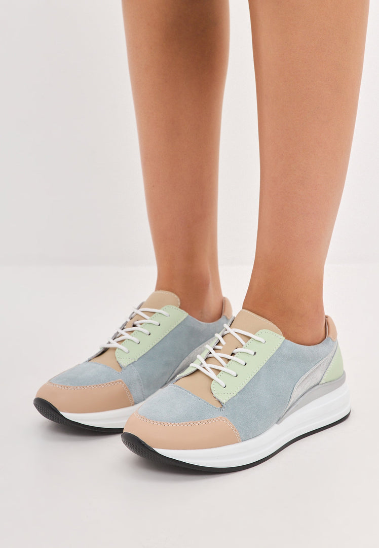 A stylish pair of blue leather sneakers with an Eva sole, perfect for casual outings and daily activities.