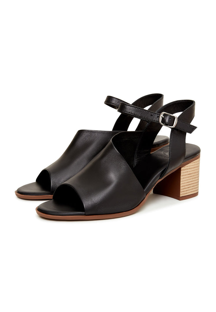 A stylish pair of black leather block heel sandals perfect for any occasion.