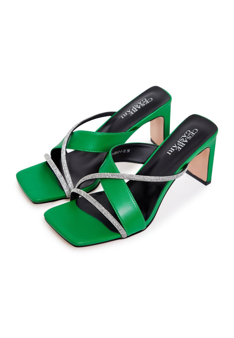 A stylish and fashion-forward pair of green strappy high heels sandals for women.