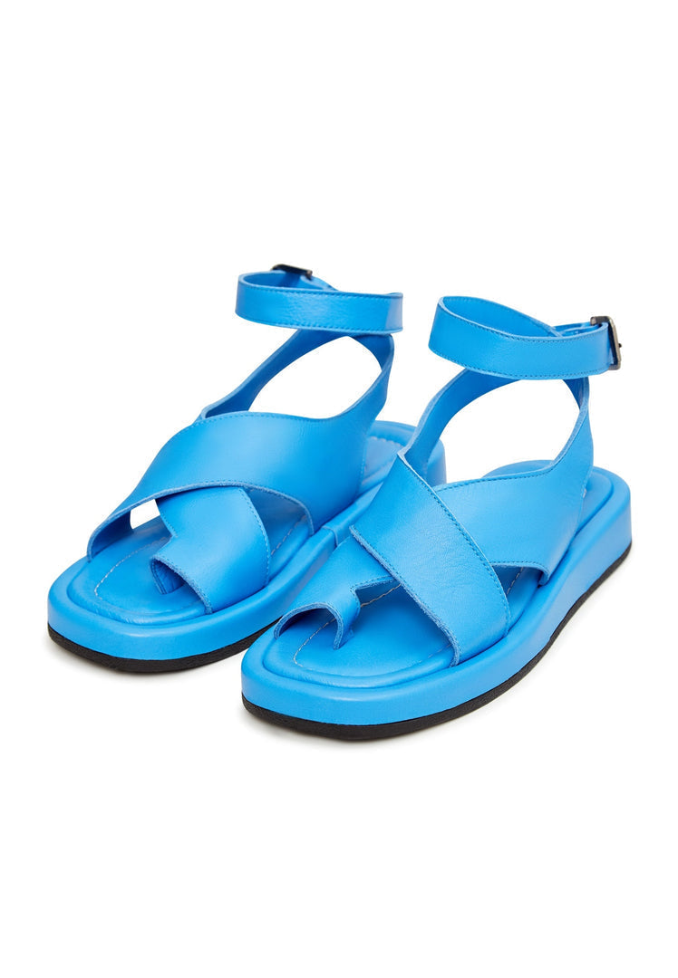 A stylish pair of women's blue leather platform wedge sandals perfect for summer.