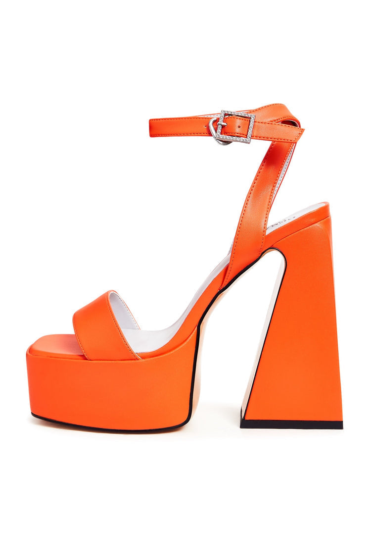 A pair of sophisticated orange high heel sandals, a must-have in any women's fashion shoes collection for an elegant and stylish look.