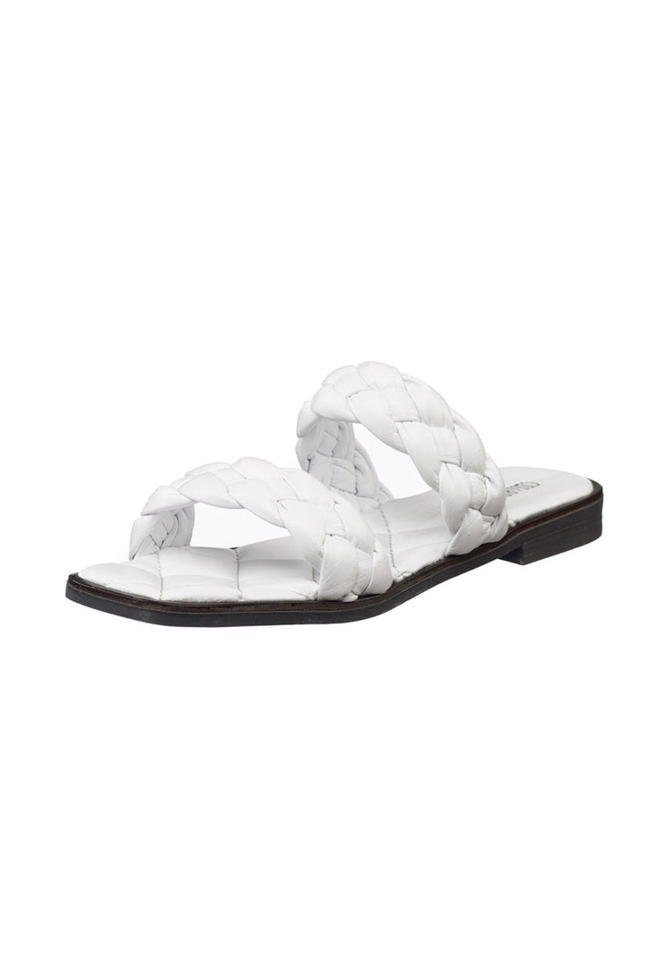 A pair of high quality soft leather white flat sole sandals for women.