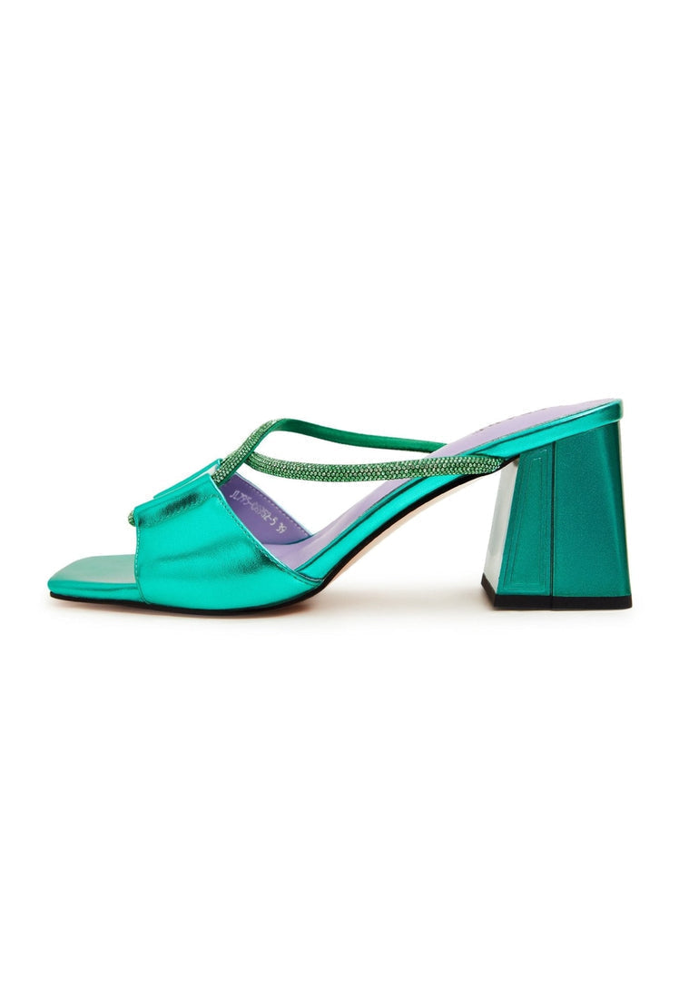 A sophisticated pair of green backless heels - the perfect chic and stylish choice for any outfit.