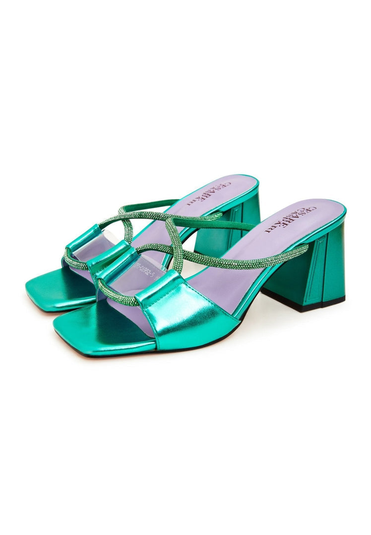 A stylish pair of green backless heels, the Rosalia heels - perfect for a chic look.