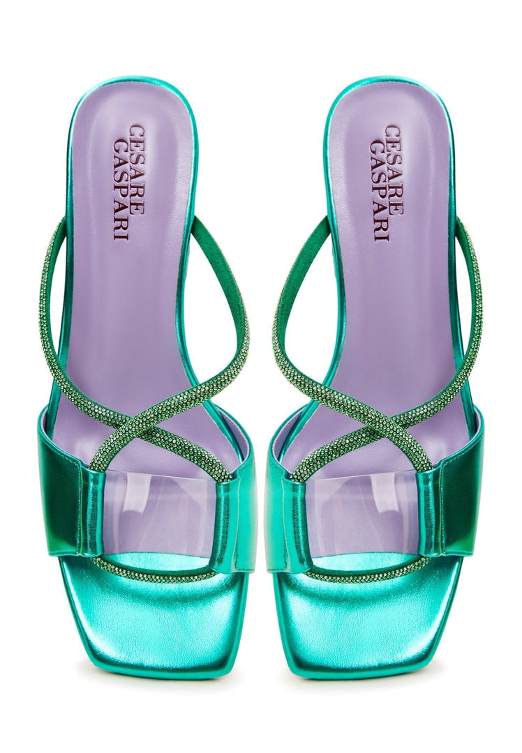 A pair of chic green backless heels with a unique design, perfect for making a fashion statement - the Rosalia heels.