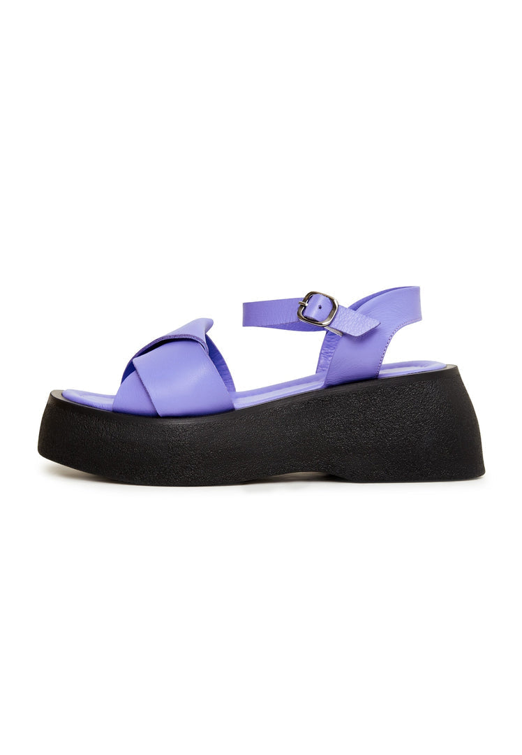 A pair of stylish lilac leather platform sandals, perfect for summer, with high heels for women.
