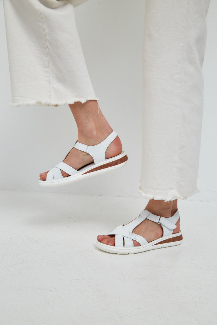 A stylish pair of leather platform heels for women, featuring urban sandals with a high heel design perfect for any modern fashionista.